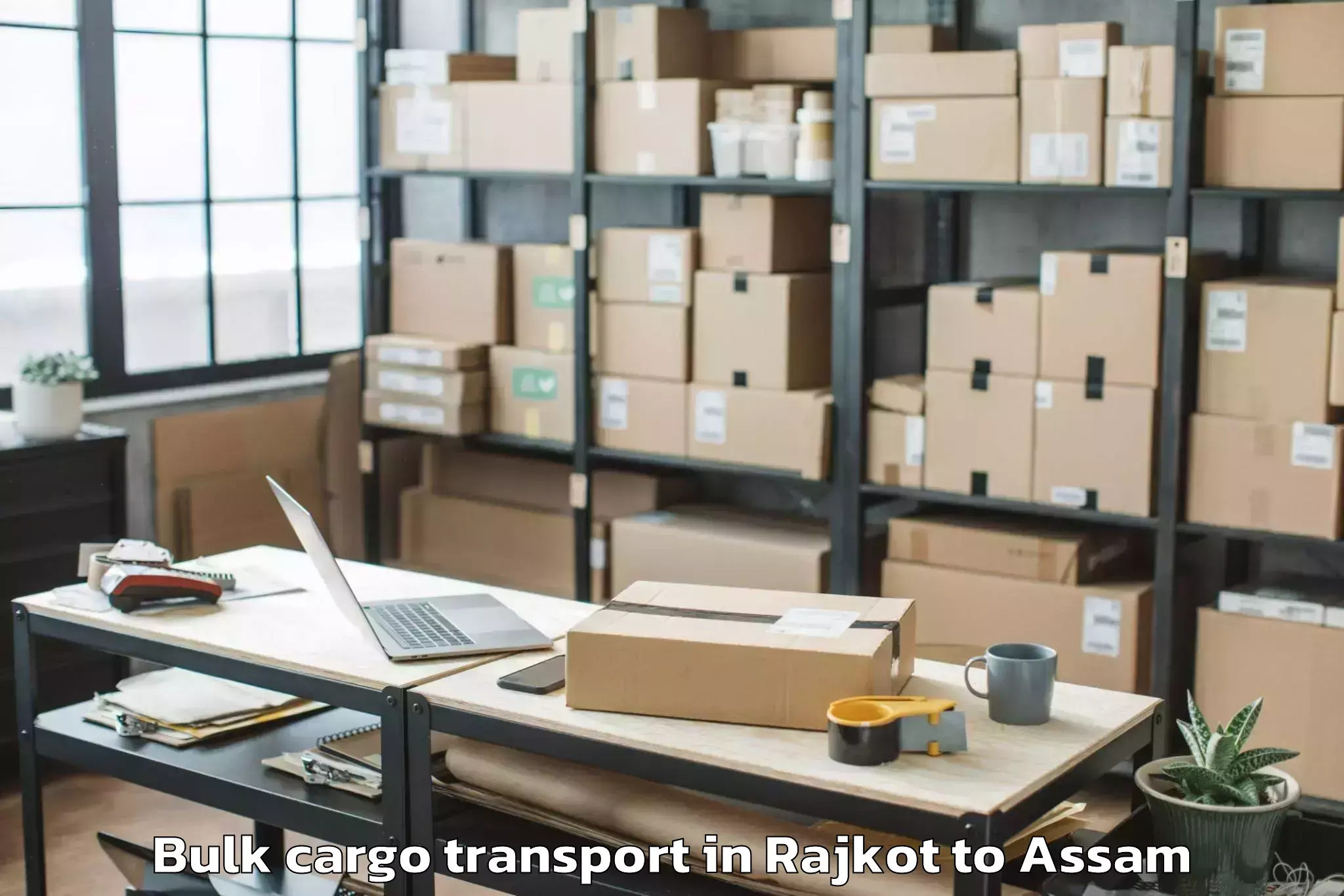 Reliable Rajkot to Fekamari Bulk Cargo Transport